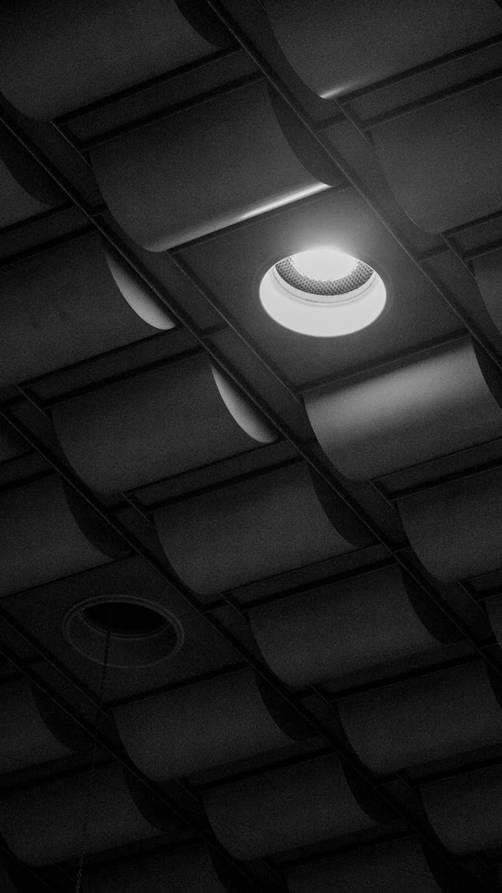abstract black and white ceiling light patterns
